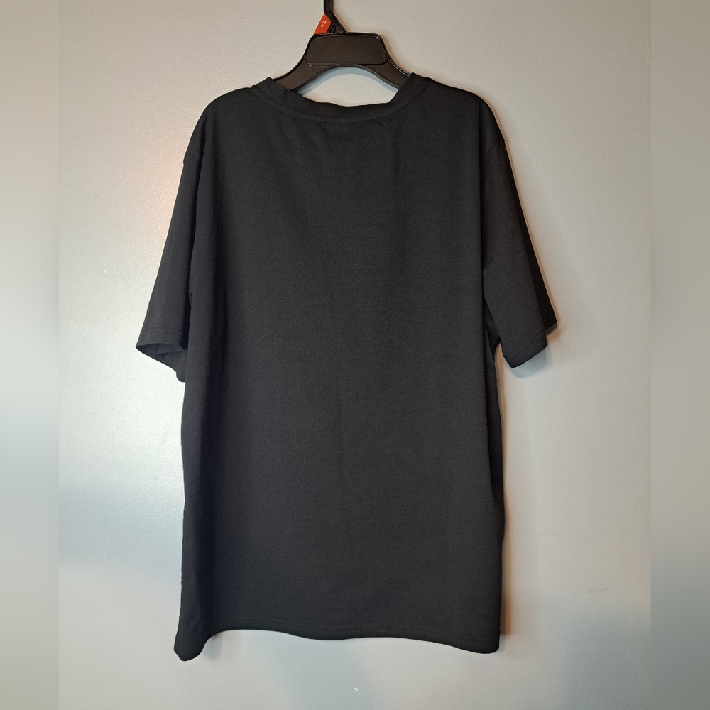 Temu pink t-shirt. Size 1xl 100% polyester - Picture 3 of 3